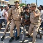 जालौन में मंदिर में तोड़फोड़ से भड़का जनाक्रोश: युवक ने शिवलिंग और नंदी की प्रतिमा को किया खंडित, हाईवे पर घंटों लगा रहा जाम जालौन के मंदिर में खंडित शिवलिंग और नंदी की प्रतिमा के पास जांच करती फॉरेंसिक टीम और आक्रोशित ग्रामीणों की भीड़