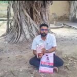 जालौन में गंभीर आरोप: सरकारी भूमि पर अवैध फैक्ट्री संचालन के खिलाफ संपूर्ण समाधान दिवस के बाहर धरने पर बैठे सभासद जालौन के नदीगांव में संपूर्ण समाधान दिवस कक्ष के बाहर नगर पालिका अधिनियम की किताब लेकर धरने पर बैठे सभासद अमित कुमार।